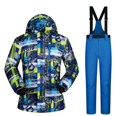 China TMW Wholesale Anti-UV winter outdoor hooded ski jacket set suspenders pants trajes De polyester esquiar fabric printed men's ski suit for sale