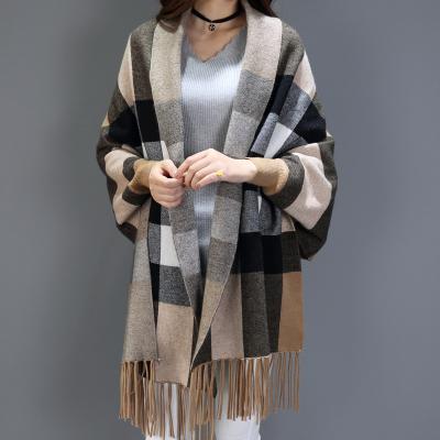 China Autumn and winter checked women knitted fringe shawl knitted coat cape for sale