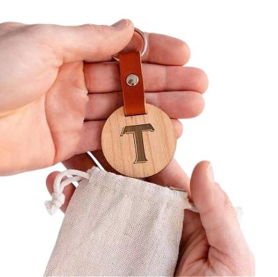 China Custom Wooden Keychains llavero/DIY Logo Wood Keyring /Wooden DIY Key Chain Laser Round Beech Walnut Maple Promotion Gift Promotion Gift for sale