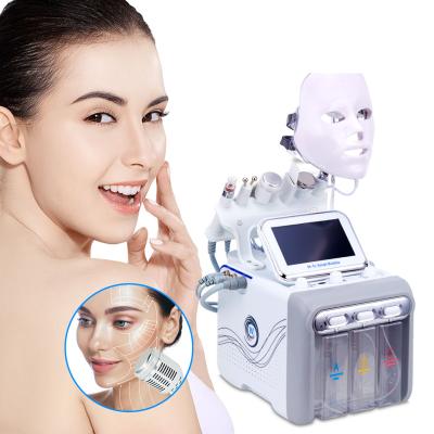 China For commercial multifunction spa use rf bio microcurren small bubble aqua peeling h2o2 solution facial machine for sale