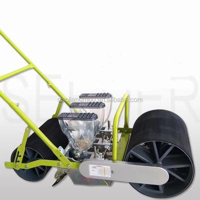 China Manual vegetable seed planter 4 row hand hold jang seeder roller for vegetable seeds for sale