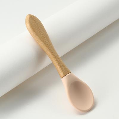 China Sustainable Wholesale Beech Wood Handle Silicone Soft Silicone Self Feeding Baby Administers Spooning for sale