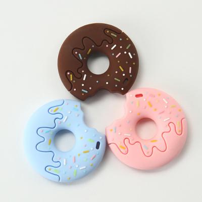 China Bring Joyful Donut Shape Wholesale Custom Food Grade BPA Free Chew Teething Toy Silicone Baby Teether for sale