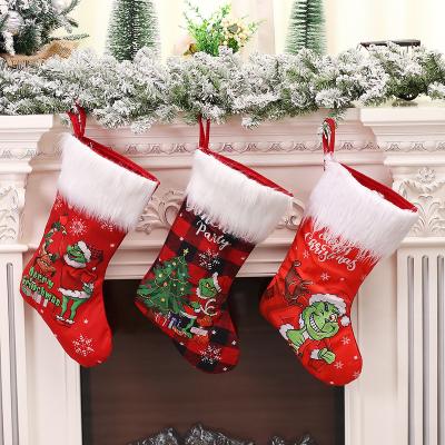 China Velvet+Non Woven 2022 Hot Sale Christmas Gift Wrapping Stocking Socks, Christmas Gift Thief Grinch Stocking Socks Home Decor for sale