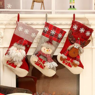 China Pile Christmas Stocking Great Christmas Gift Bags Fireplace Decoration Bangs New Year Candy Holder Xmas Decor For Home for sale