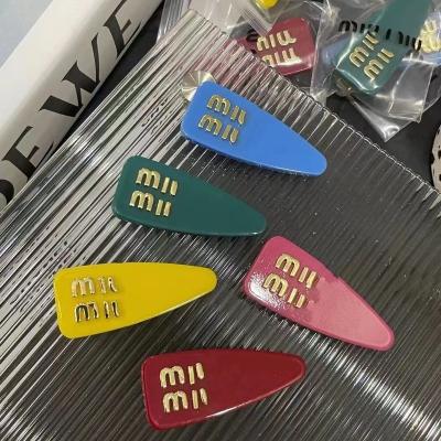 China Letters hair clip summer new hairpin candy color triangle hair clip side clip side blow acrylic European and American fashion beautiful for sale