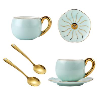 China Sustainable Mint Green Round Ceramic Neg Ions Tea And Coffee Cup Saucer Set Gold Attached Spoons for sale