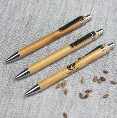 China Wooden logo ball pen with metal clip for sale