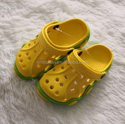 China Flat Customized Two Color Eva Kids Clogs Cheap Garden Shoes for sale