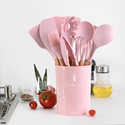 China Hot Sale Viable Hot Pink Handle Silicone Kitchenware Wooden Cookware Sets Tool Kit for sale