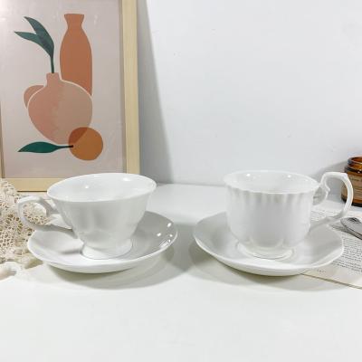 China Wholesale Elegant White Ceramic Coffee Cup and Saucer Factory Design Afternoon Tea Cup and Saucer Set Stocked Ceramic for sale