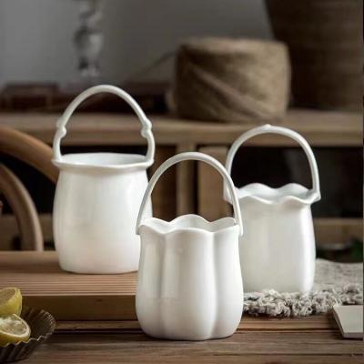 China Creative White Flower Stocked Basket Shape Utensil Holder Porcelain Spoon And Fork Ceramic Container For Kitchen Home Decor for sale