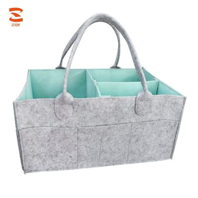 China 100% Eco-friendly Multi Pockets Portable Nursery Organizers Storage Basket Bag Felt Baby Diaper Cart for sale