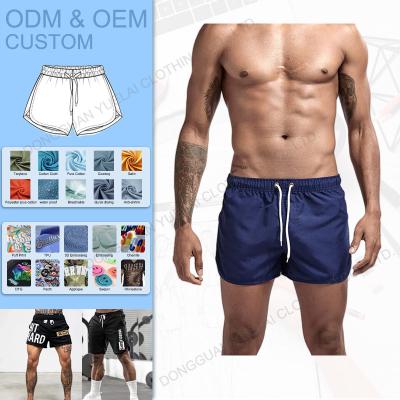 China Anti-wrinkle Wholesale Printed Mid-Waist Quick-Drying Men's Shorts Slit Tight Swimming Trunks Fitness Training Cotton Drawstring Sweat Shorts for sale