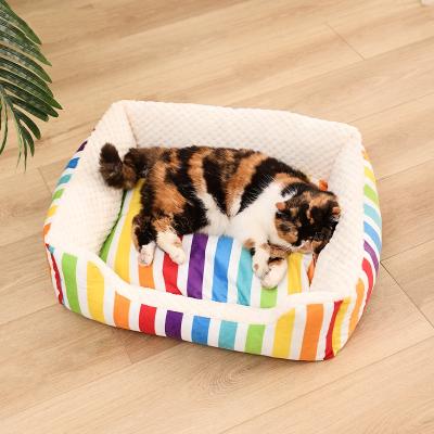 China Removable Dog Bed Ultra Soft Washable Faux Fur Blanket Donut Sofa Pet Cat Cushion Beds for sale