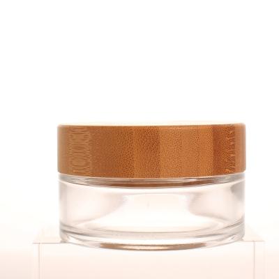 China Personal Skin Care Packaging 100ml Custom Your Own Label Screw Bamboo Lid Bamboo Lid Face Cream Packaging 15ml 30ml 50ml 100ml Glass Cream Jar With Low Price for sale