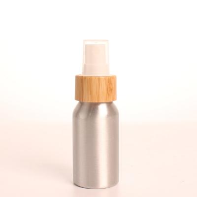 China Personal Skin Care Packaging Handsome Style 40ml Bamboo Sprayer Bottle Face Spray Bottle Eco-friendly Aluminum Portable Bottle for sale