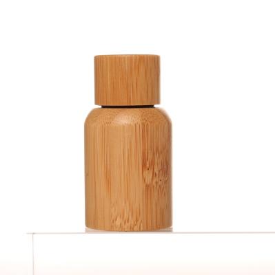 China High Quality Personal Packaging 5ml Bamboo Screw Cap Skin Care Cover Cosmetics Essential Oil Bamboo Bottle With Glass Liner for sale