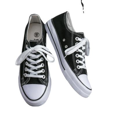 China Durable Classic Canvas Sneakers White Black Lace Up Casual Sports Unisex for sale