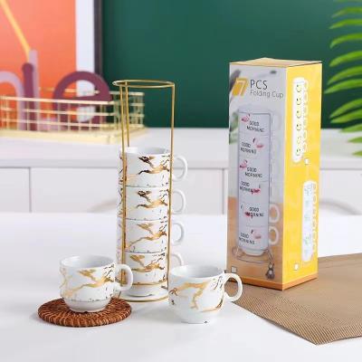 China New Viable Wholesale High Quality Ceramic Mug Coffee Mug Six Sets Middle Eastern Style Tea Cups With Iron Stand for sale