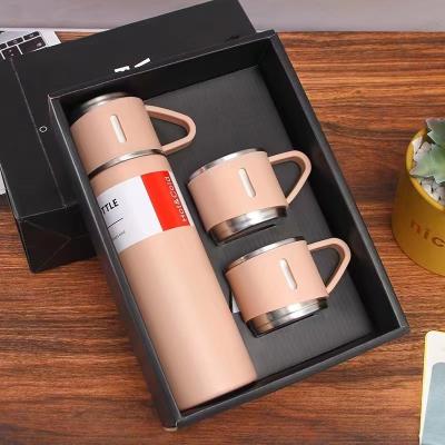 China Luxury Stainless Steel Water Bottle Double Walled Vacuum Insulated Sports Thermal Flask with 3 Cups for sale