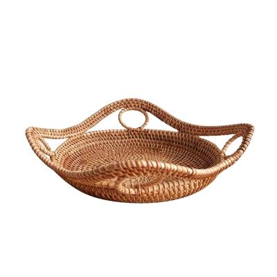 China Viable Custom Portable Snack Basket Fruit Bread Tray Rattan Vietnam Storage Desktop Basket for sale