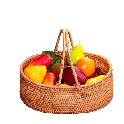 China Sustainable round shape with lid, high quality handwoven rattan storage, candy storage with handle for sale