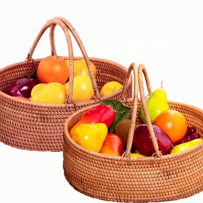 China Portable Living Basket Family Flower Fruit Storage Basket Hand Rattan Country Style Outdoor Picnic Basket for sale