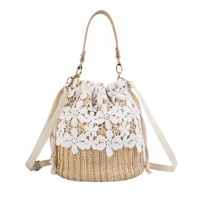 China 100% New Environmental Protection Bag Wholesale Korean Straw Woven Bucket Bag Chain Shoulder Messenger Portable Beach Bag for sale