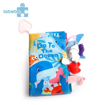 China Popular Style Customizable Premium Set Material Eco-friendly Cover Cloth Kids Ocean Shark Tail Baby Educational Cloth Book for sale