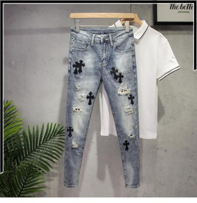 China European and American waterproof custom cotton LOGO high-end ripped high-end light blue pencil pants new paint jeans for sale