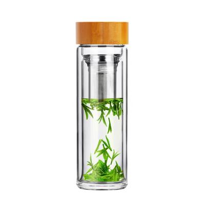 China Double Wall High Quality Viable Borosilicate Tea Double Wall Water Bottle Glass Water Bottle With Bamboo Lid Unbreakable Water Bottle for sale