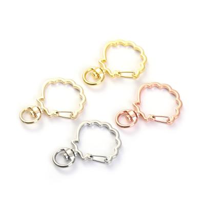 China Europe Shell Shape Metal Key Chain Shiny Plated Custom Colored With End Ring Attachment for sale