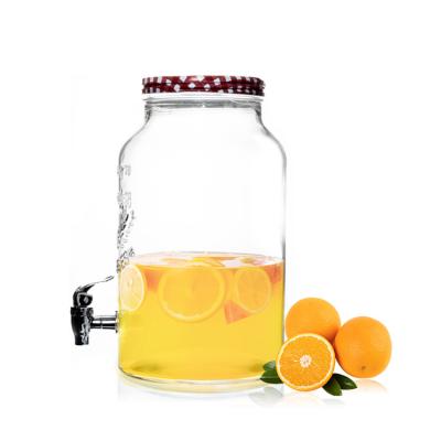 中国 Glass Beverage Dispenser juice dispenser with tap and embossed customs logo 販売のため