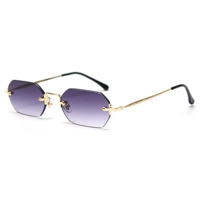 China New fashion high quality small polygon INS sunglasses street style frame sunglasses female personality frameless shot for sale