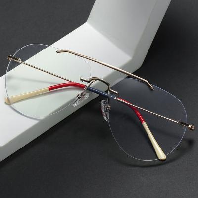 China Fashionable Blue Rimless Blue Rimless Computer Anti Radiation Vintage Eyeglasses Anti Light Optical Glasses for sale