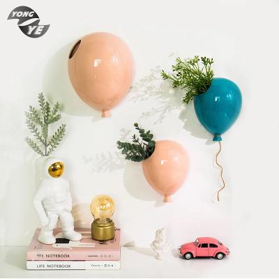 China Wall hung vase creative home ornament multicolor fashion balloon shape ceramic wall hung vase for sale