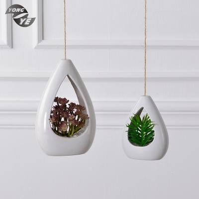 China Modern Indoor Elegant Rope Shape Love Decoration Home Decoration Ceramic Hanging Vase Hanging Pot for sale