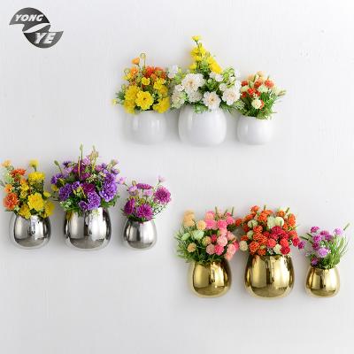 China Wall hung face designs decorative ceramic vase china home hotel goods decoration flower vase chinese types for sale