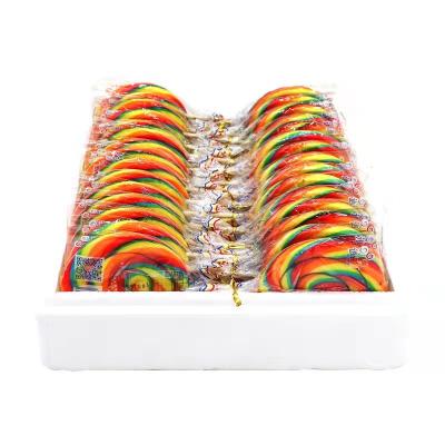 China Large Size 80g Natural Giant Swirl Lollipop Flat Candy Rainbow Candy for sale