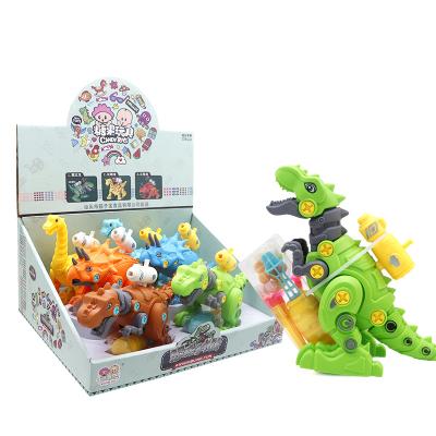 China Low MOQ Assorted Promotion Gift 1502 Disassembly And Assembly Dinosaur Battle Candy Toy for sale