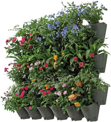 China Pastoral Green 3 Pocket Self Watering Vertical Wall Planter Plastic Flower Pots for sale