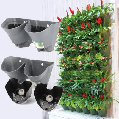 China Who respects the environment; high & Wholesale Low Temperature Resistance 2 Pockets PP Eco-friendly Container Hanging Flower Pot Plastic Vertic Garden Wall Planter Pot for sale