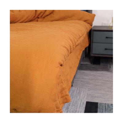 China Wholesale Disposable High Quality Silky Solid Soft Comforter Sheet Pure Orange Pure Linen French Linen Bedding Set for sale