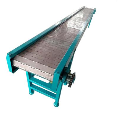 China Top Quality Heat Resistant Cement Chain Conveyor Feeder Machine With Hopper for sale