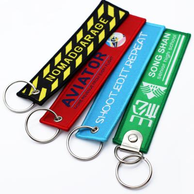 China Eco-friendly Customized Shape Embroidery Twill Pilot Key Tag Embroidered Chain Key Ring For Promotion Business Gift for sale