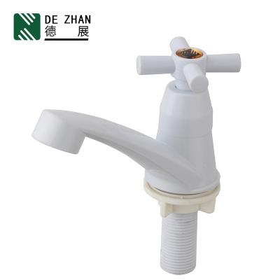 China CLASSIC Classic Wall Mounted Single Handle Faucet White Plastic Water Tap In Basin Faucets for sale