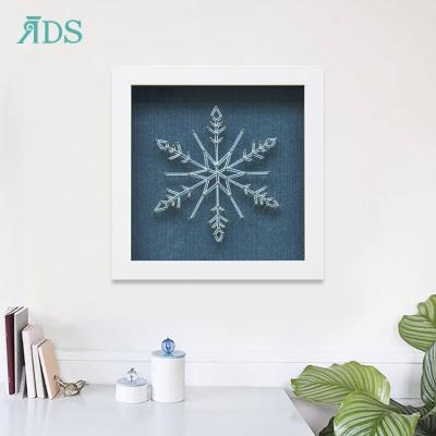 China Coastal Handmade Picture Wall Snow Shape Framed Wall Decor Accessories 3D Line Art for sale