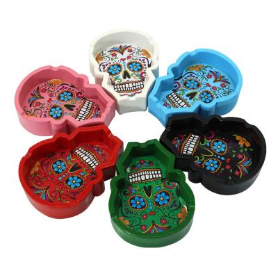 China Morden 2023 Coloful Hot Selling Creative Skull Designs Resin Ashtray for sale