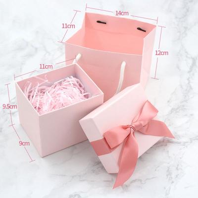 China Custom High End Recycled Materials Luxury Jewelry Paper Packaging Gift Boxes With Ribbon Bow for sale